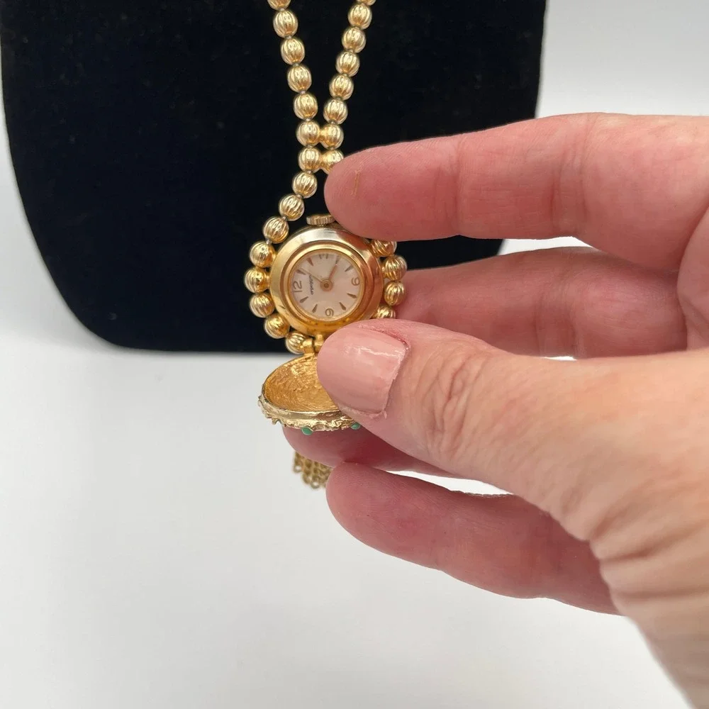 Unbranded Goldtone Metal Womens OS Vintage Peek A Boo Tassel Watch Necklace 24